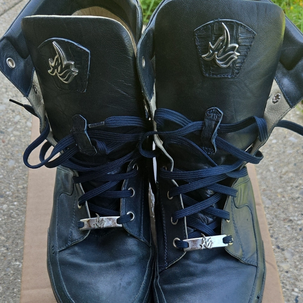 Black High-Top Leather Boots with Metallic Hardware